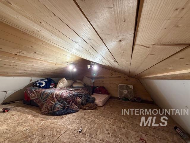 155 Mule Deer Kamiah, ID 83536 - Photo 10 of 25 Additional living space with a vaulted wooden ceiling