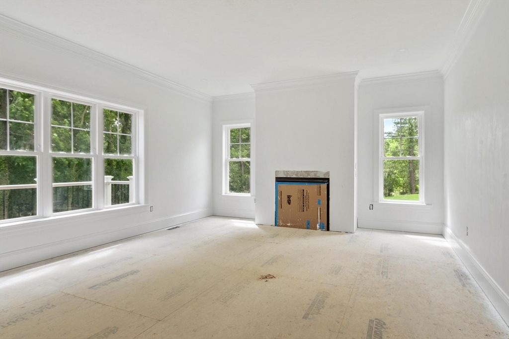 37 Dogwood Road Littleton, MA 01460 - Photo 12 of 36 a view of an empty room with a window