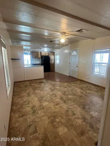 a view of a hallway with stairs