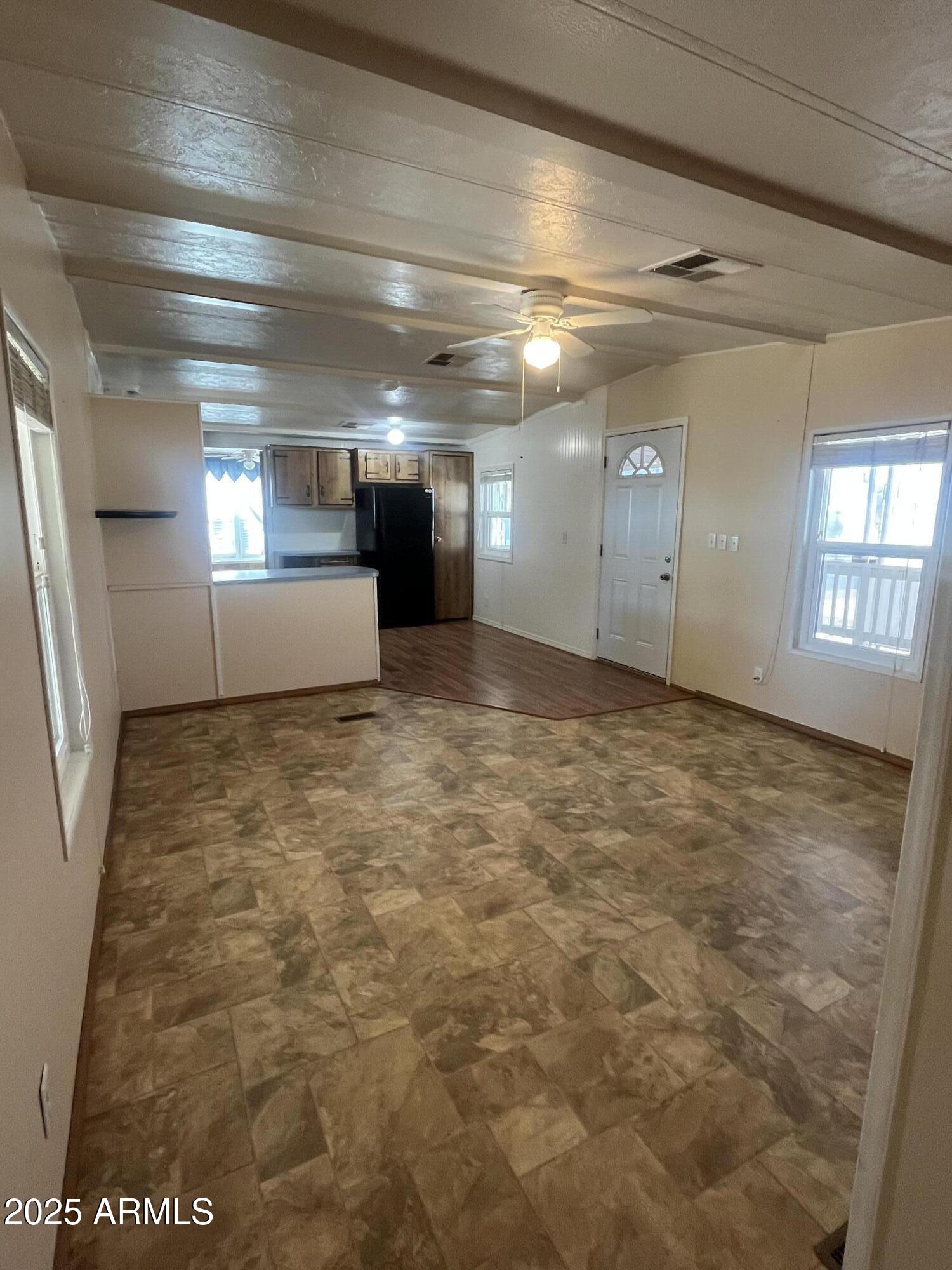 2481 West Broadway Avenue, Unit 31 Apache Junction, AZ 85120 - Photo 6 of 12 a view of a hallway with stairs
