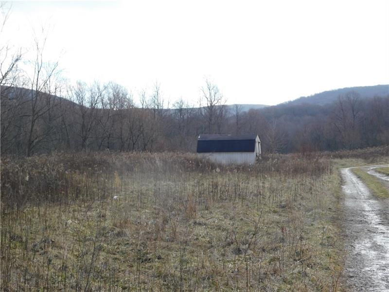 0 Hope Road Uniontown, PA 15401 - Photo 4 of 6 a view of a dry yard with wooden fence