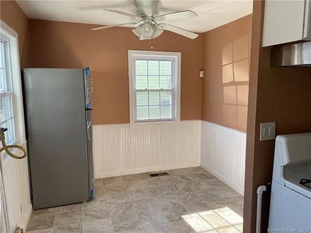 a bathroom with a sink a bathtub and shower