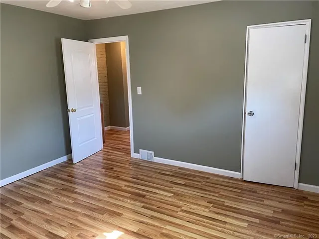 a view of a room with a large window