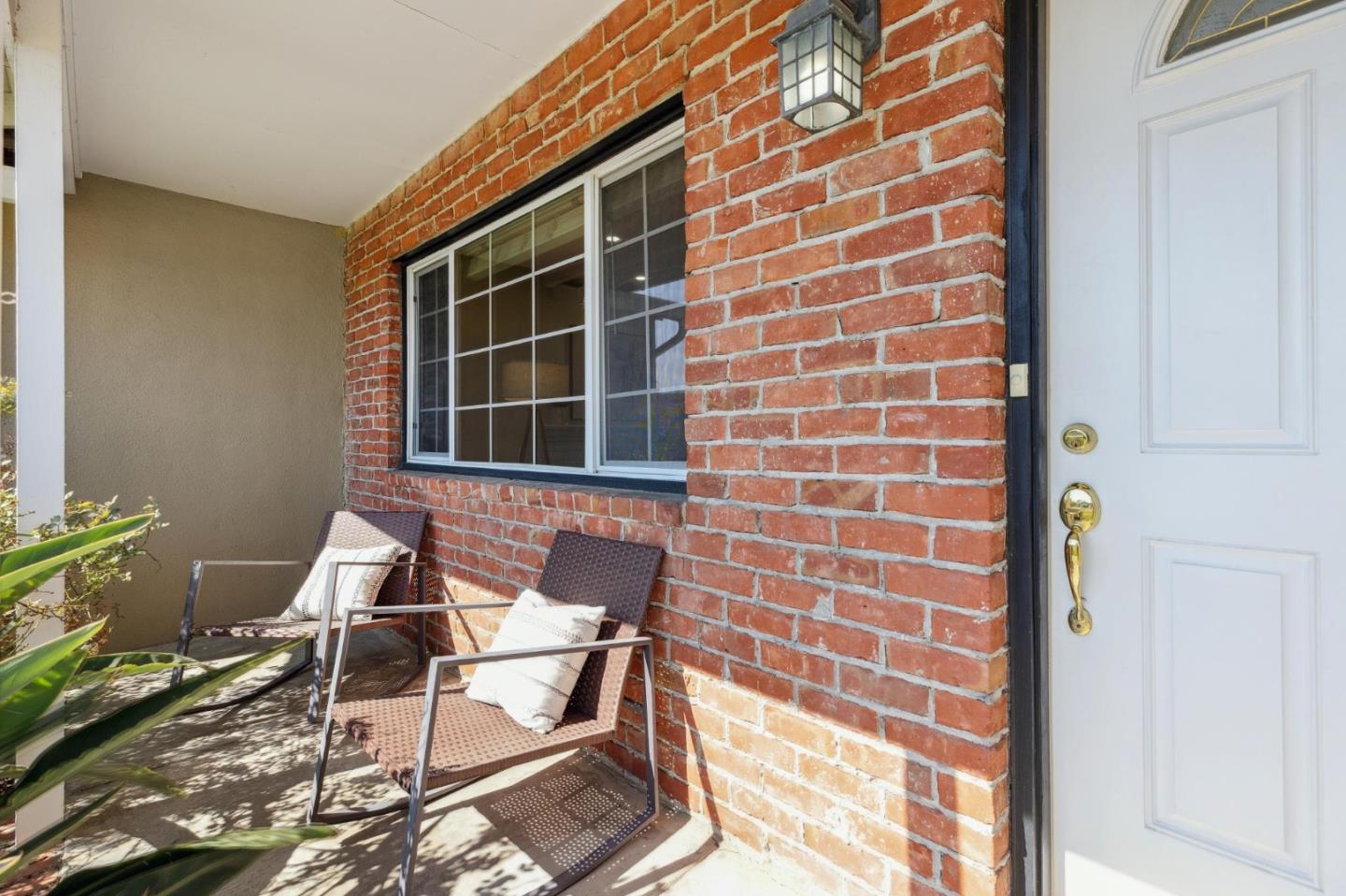 7527 Sutton Lane Dublin, CA 94568 - Photo 11 of 45 a patio with table and chairs and potted plants