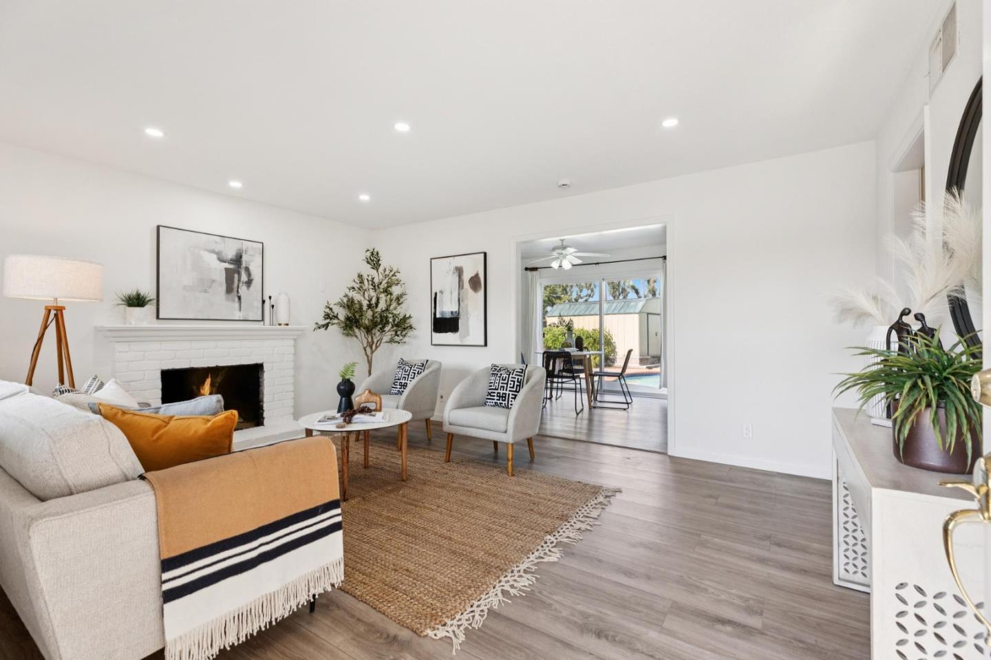 7527 Sutton Lane Dublin, CA 94568 - Photo 13 of 45 a living room with furniture and a fireplace
