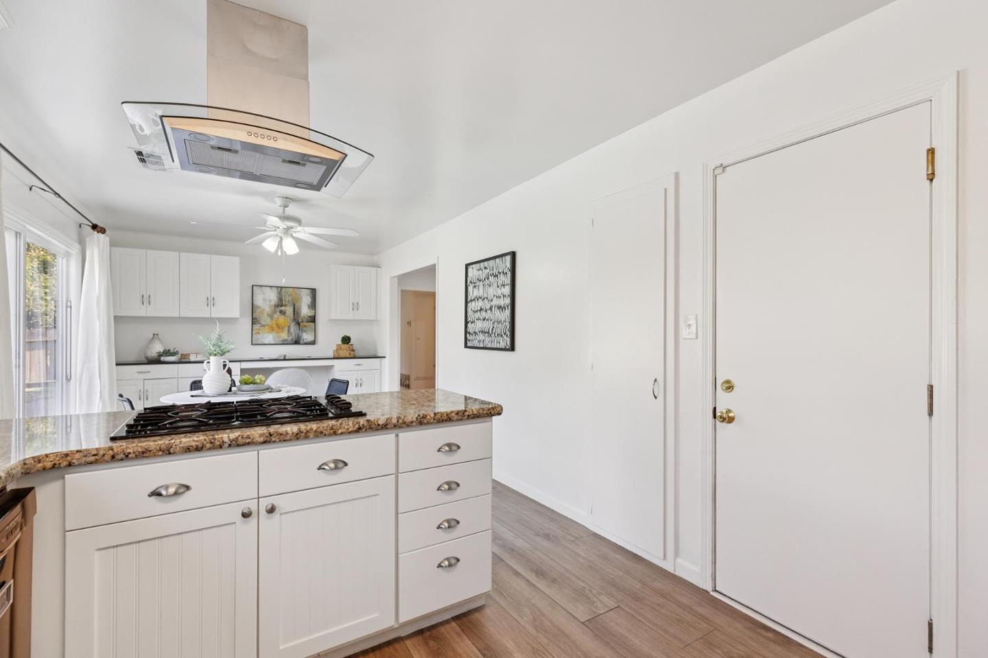7527 Sutton Lane Dublin, CA 94568 - Photo 17 of 45 a kitchen with cabinets and window