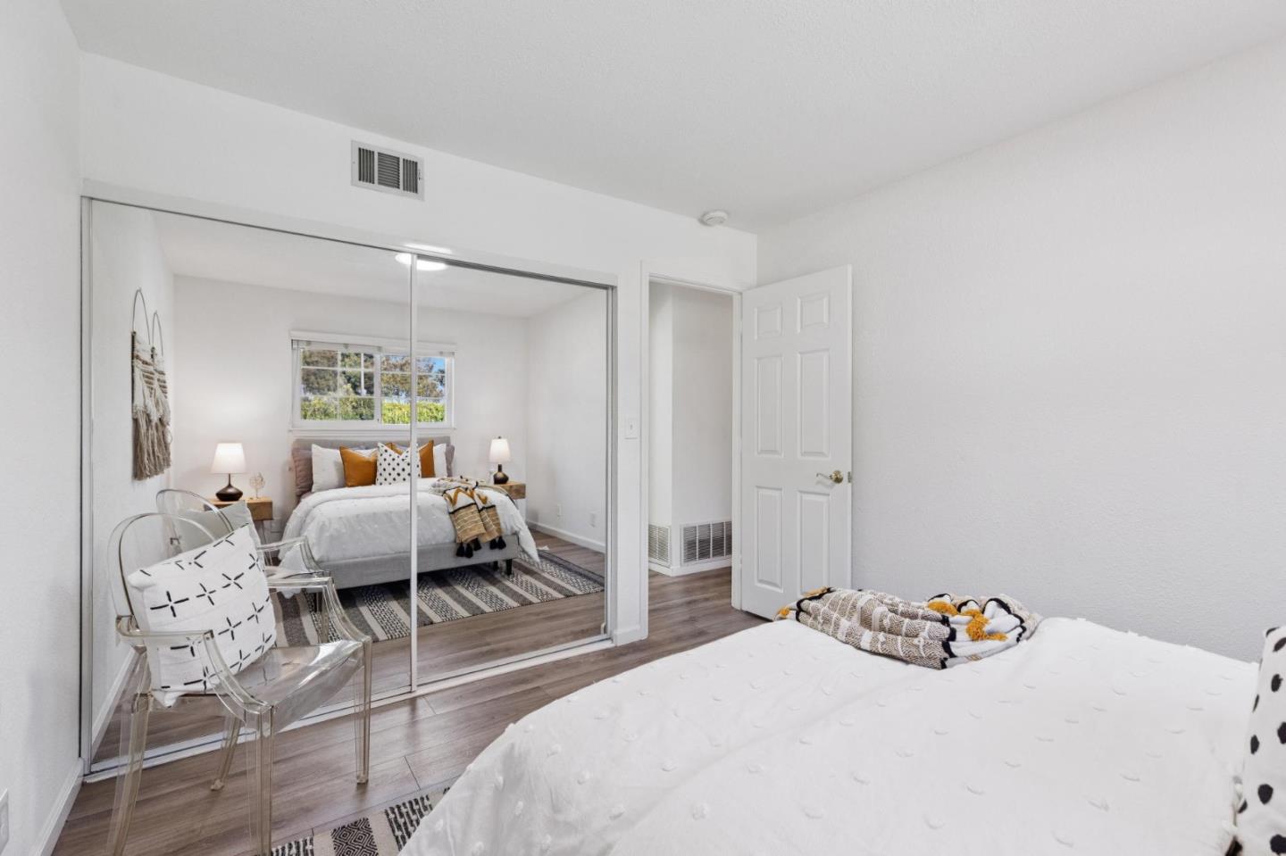 7527 Sutton Lane Dublin, CA 94568 - Photo 27 of 45 a bedroom with a bed and window