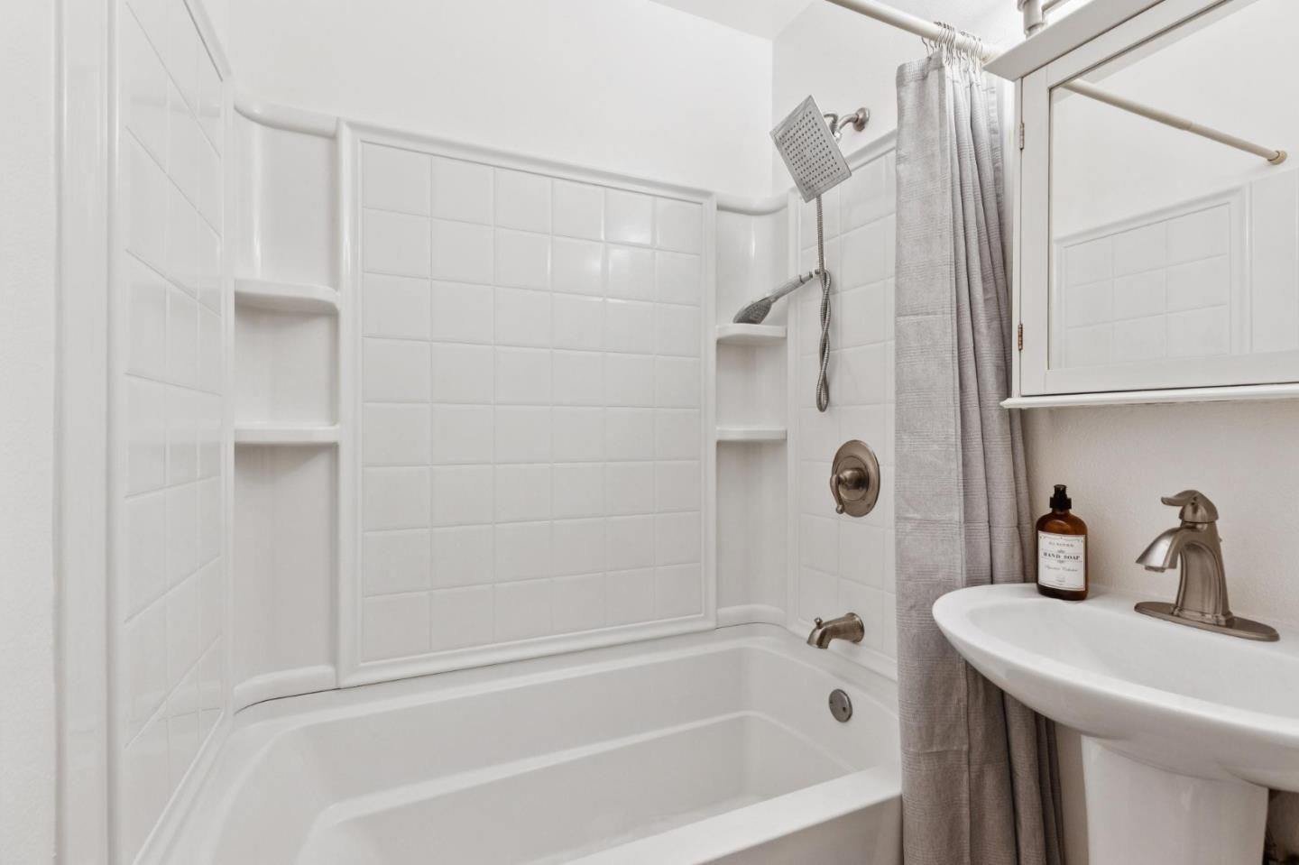 7527 Sutton Lane Dublin, CA 94568 - Photo 32 of 45 a bathroom with a shower and a sink