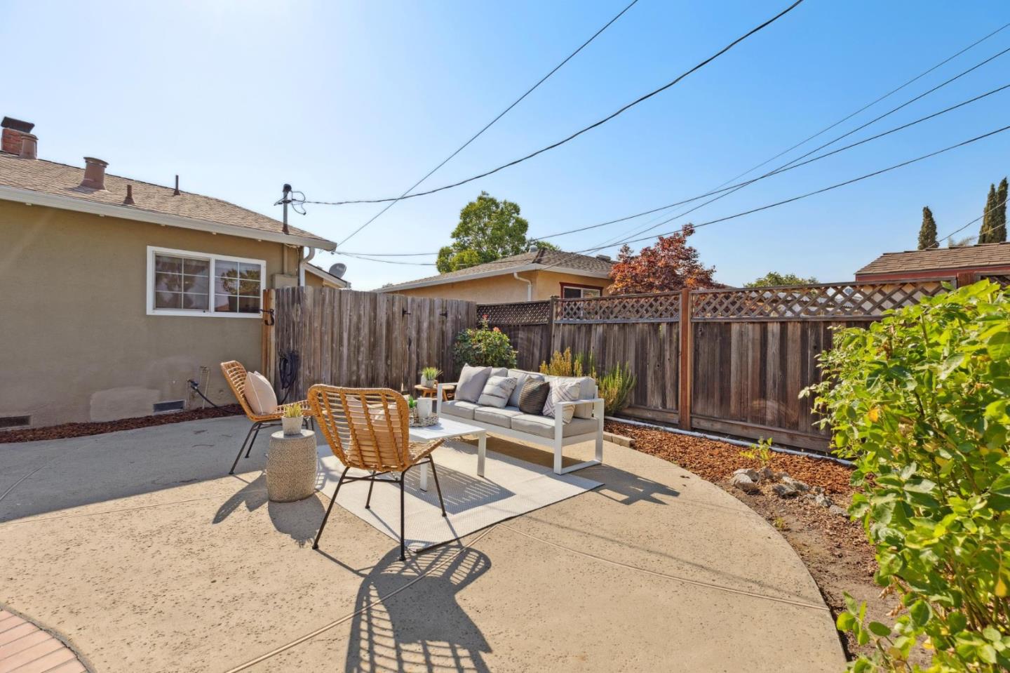 7527 Sutton Lane Dublin, CA 94568 - Photo 36 of 45 a view of a chairs and tables in the back yard of the house