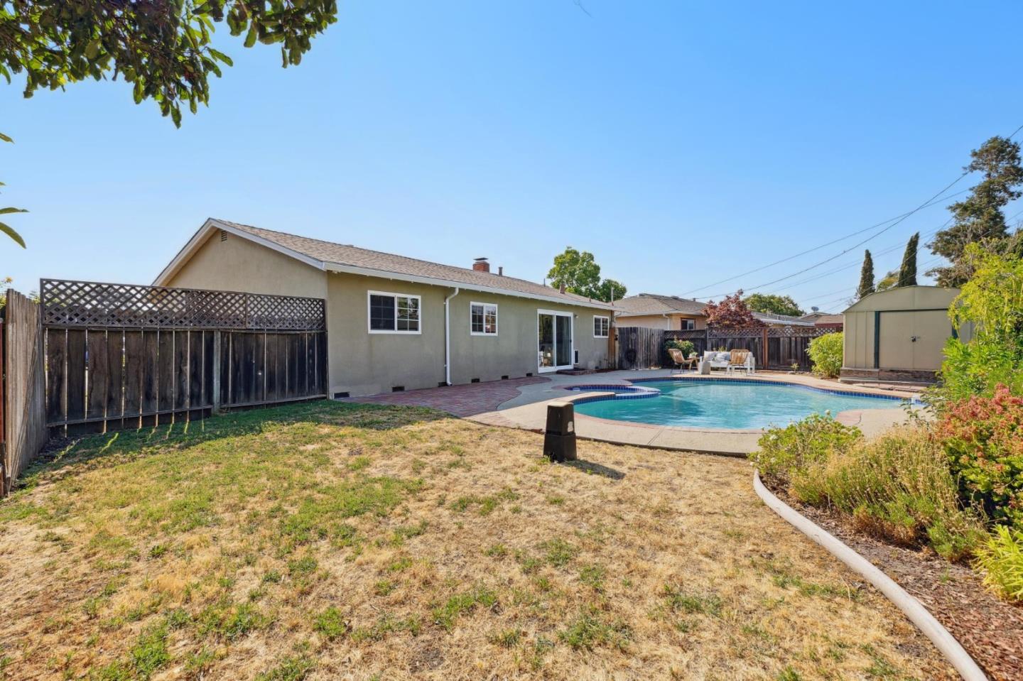 7527 Sutton Lane Dublin, CA 94568 - Photo 37 of 45 a front view of a house with a yard