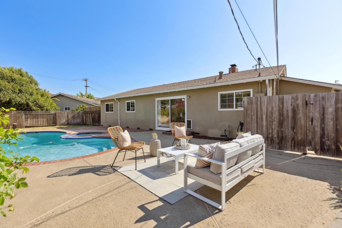 7527 Sutton Lane Dublin, CA 94568 - Photo 39 of 45 a view of a patio with a table and chairs