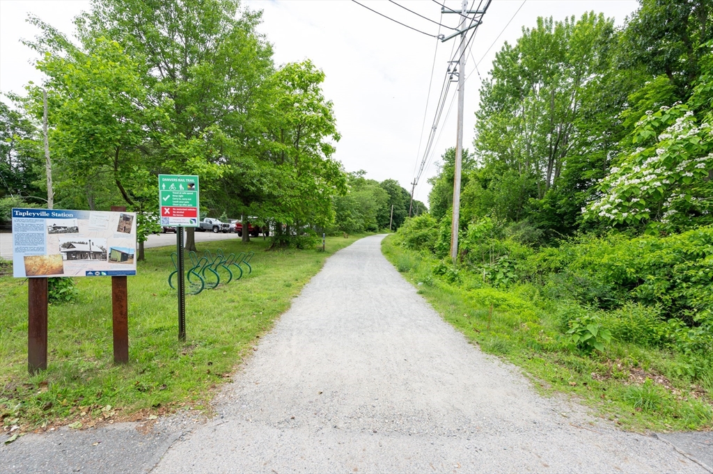 63 Adams Street Danvers, MA 01923 - Photo 16 of 42 a view of a park with large trees