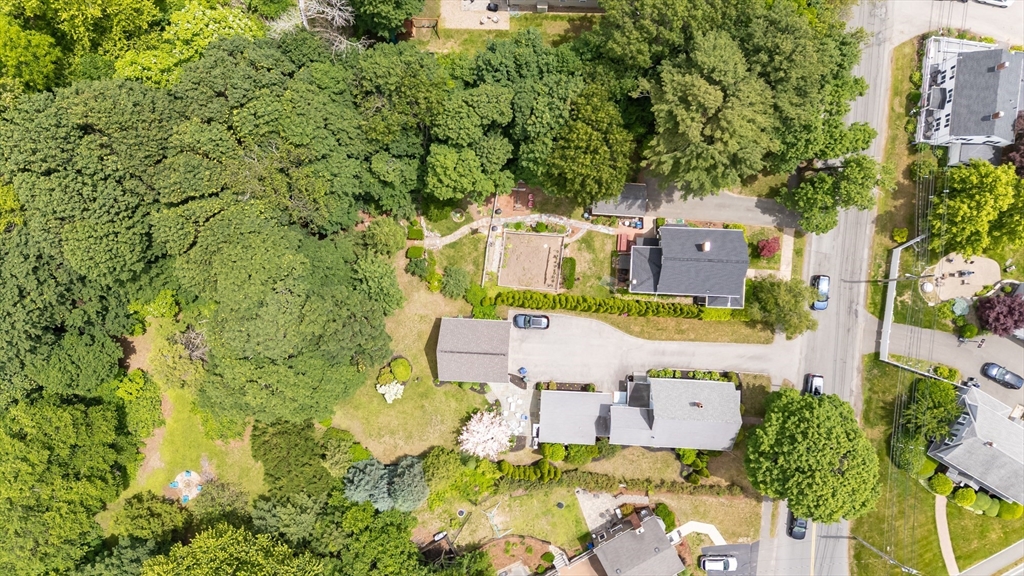 63 Adams Street Danvers, MA 01923 - Photo 40 of 42 an aerial view of a house with a yard basket ball court and outdoor seating