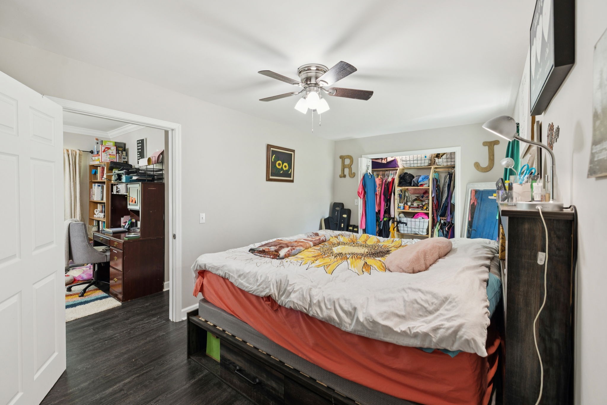 736 Hancock Road Jasper, TN 37347 - Photo 20 of 42 a bedroom with a bed and a chandelier