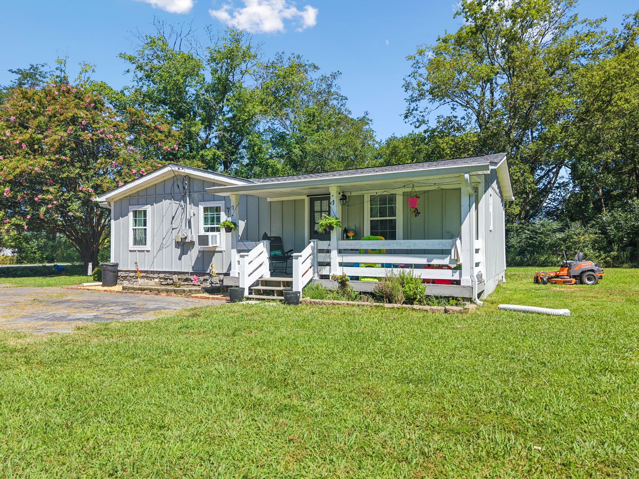 736 Hancock Road Jasper, TN 37347 - Photo 2 of 42 a view of a house with a yard and sitting area