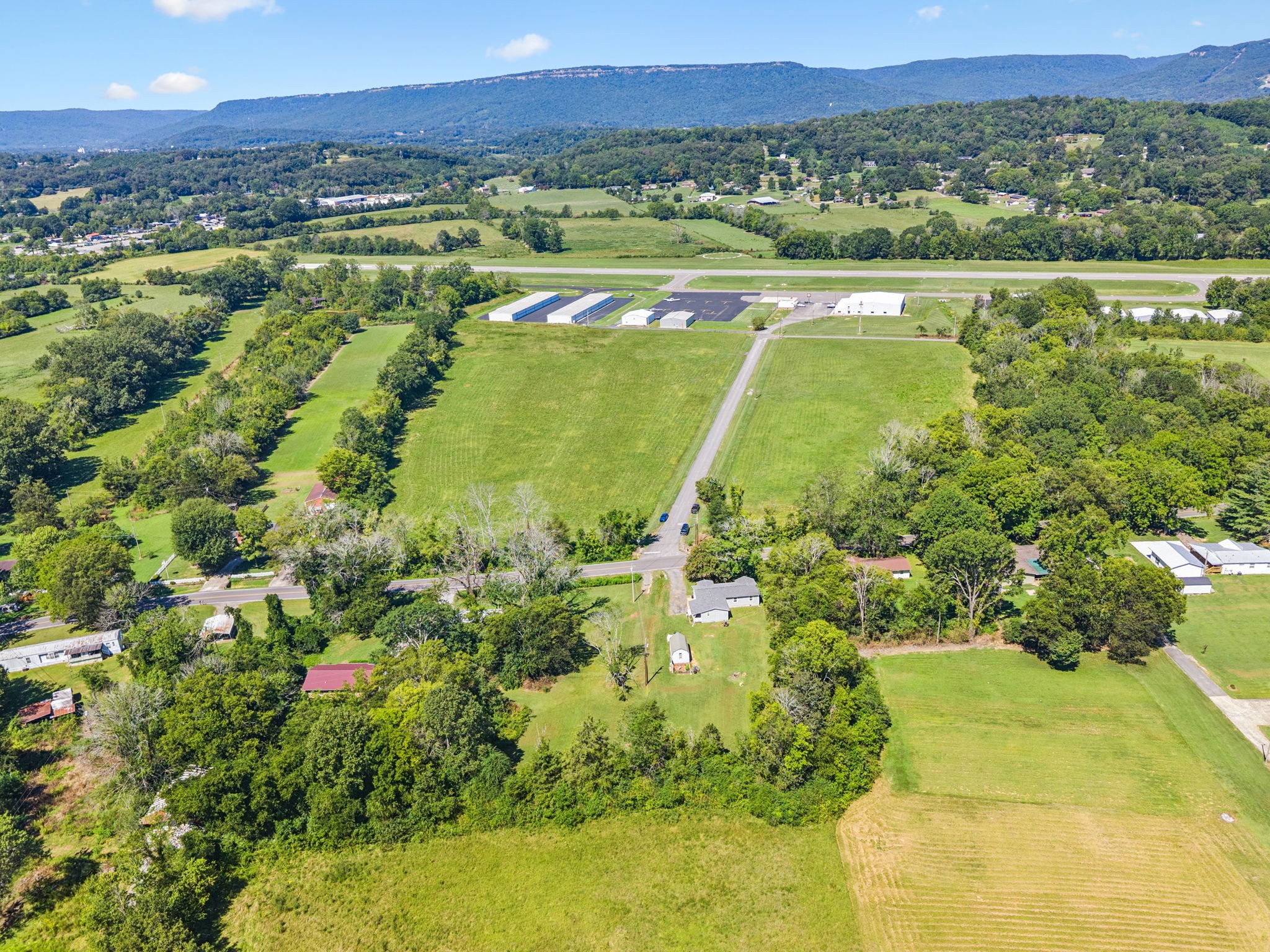 736 Hancock Road Jasper, TN 37347 - Photo 38 of 42 a view of a lake with a mountain