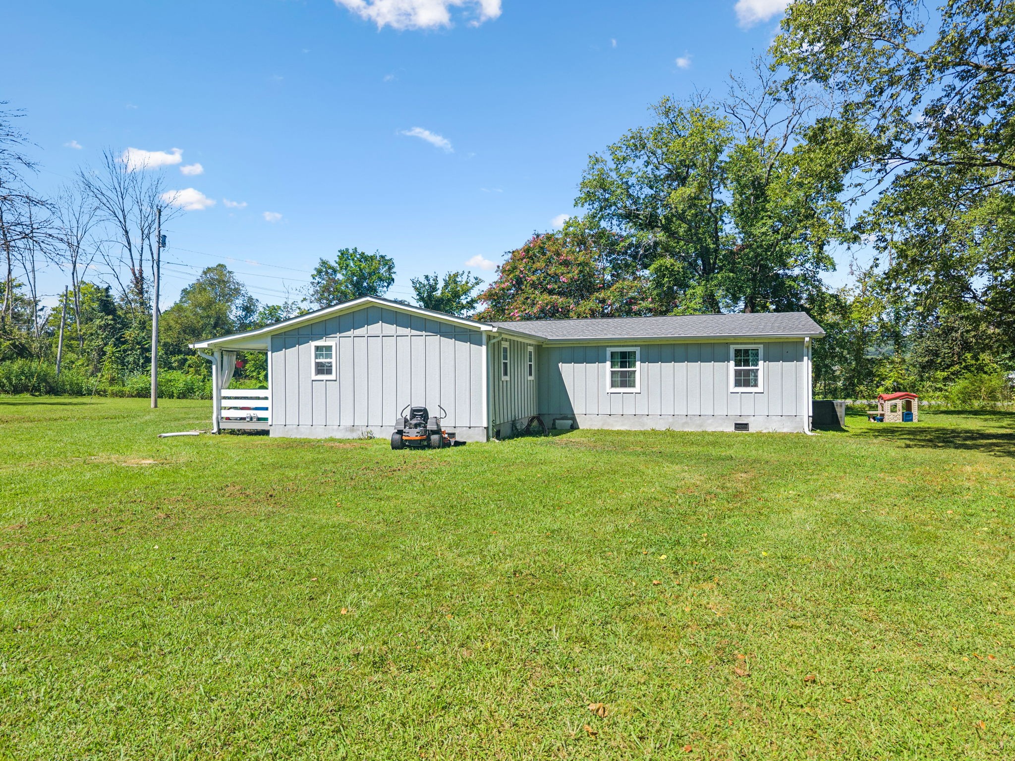 736 Hancock Road Jasper, TN 37347 - Photo 4 of 42 a view of a backyard with large trees
