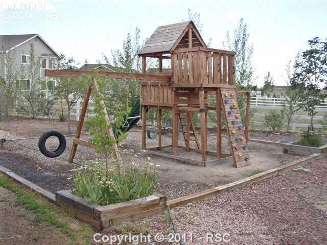 7780 Midnight Road Peyton, CO 80831 - Photo 15 of 16 Childrens playset