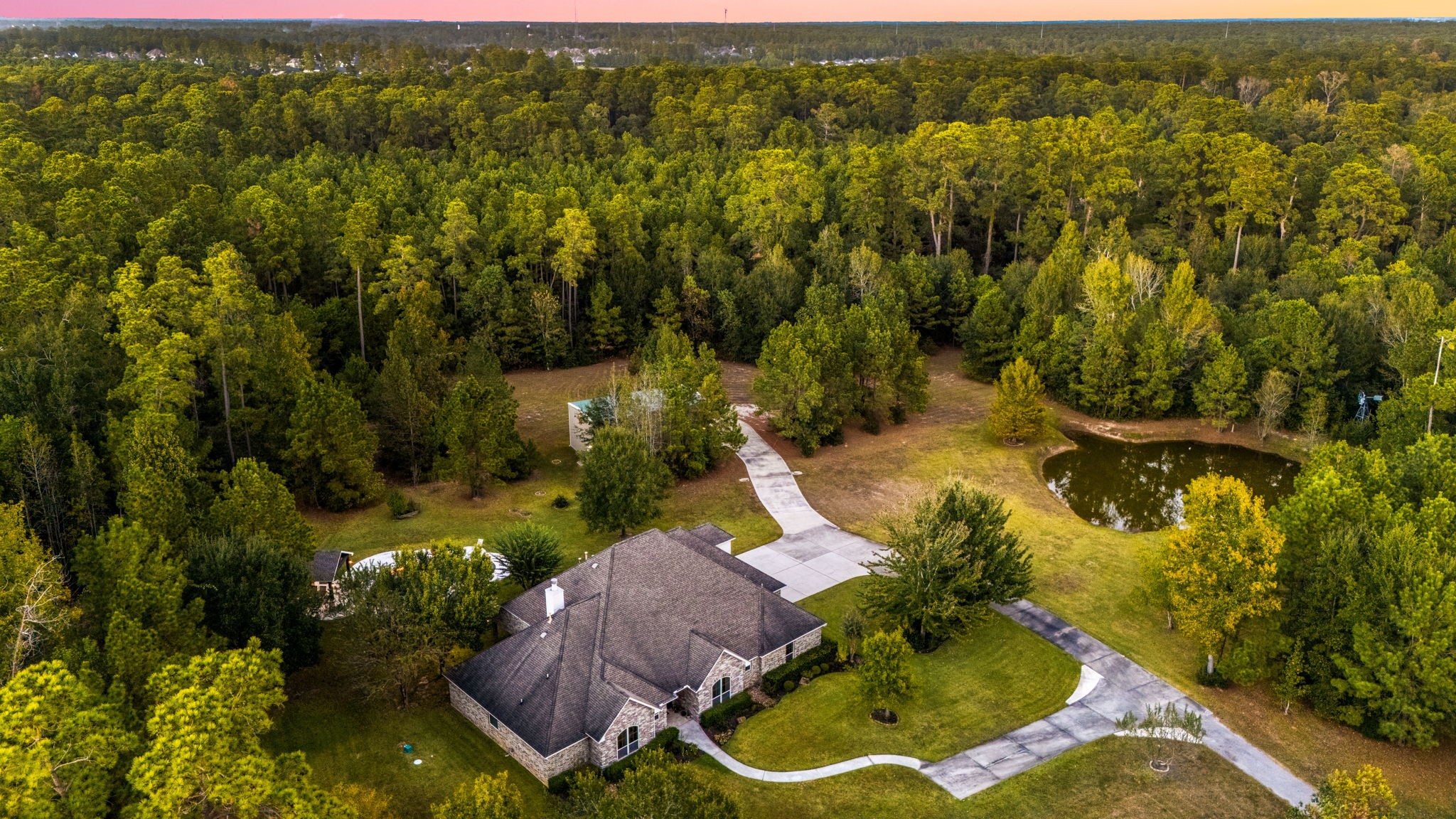 13506 Stagecoach Road Magnolia, TX 77355 - Photo 2 of 37 an aerial view of residential house with outdoor space and trees all around