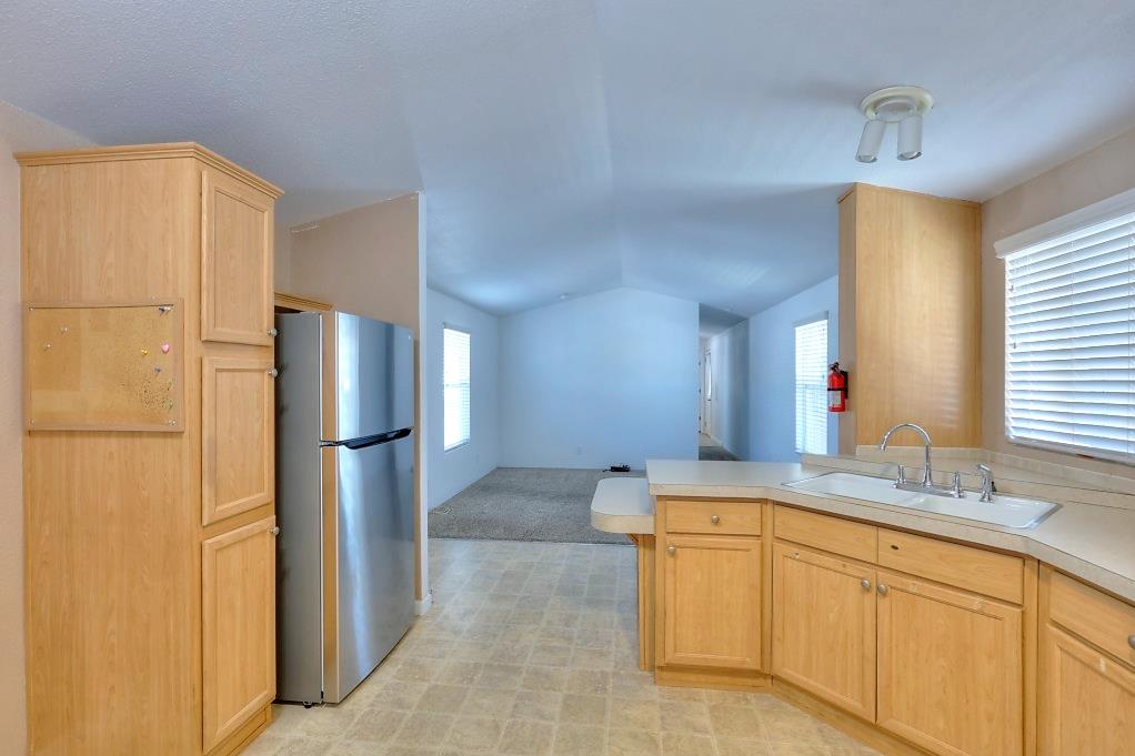 3506 Homestead Way Ceres, CA 95307 - Photo 14 of 39 a spacious bathroom with a double vanity sink and mirror