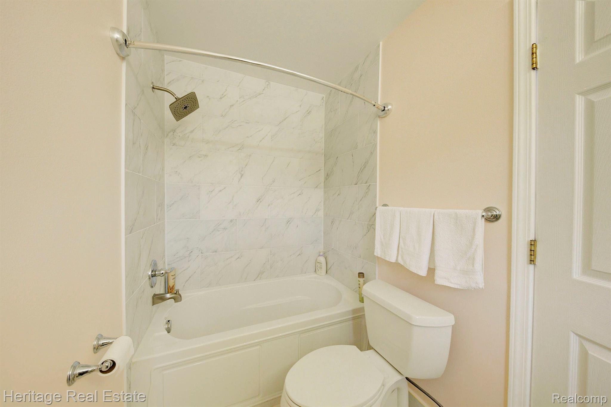 111 Eagle Ridge Road Lake Orion, MI 48360 - Photo 33 of 56 primary bathroom, tile surrounding tub