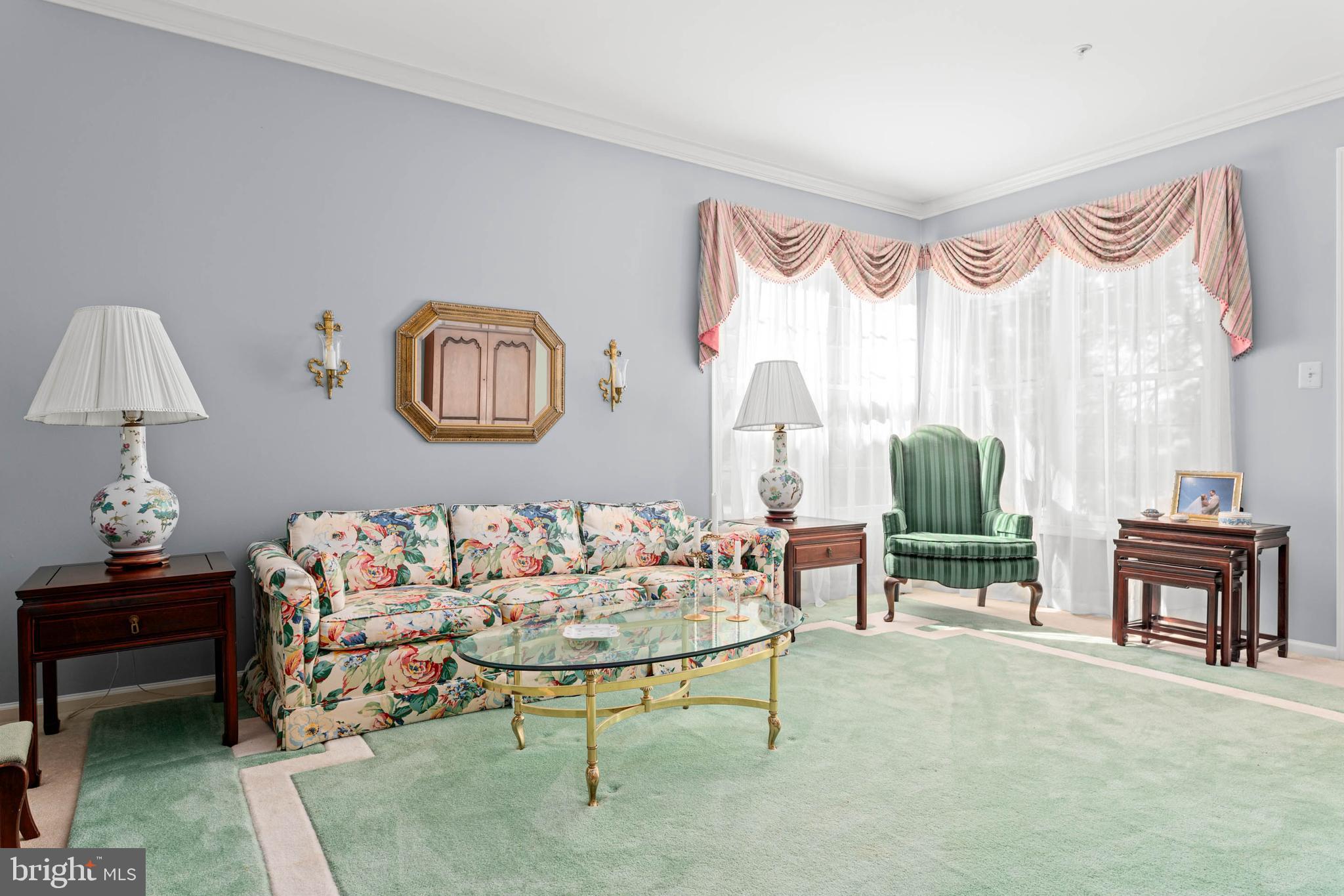 4 Riders Run Newtown Square, PA 19073 - Photo 22 of 64 a living room with furniture and a large window