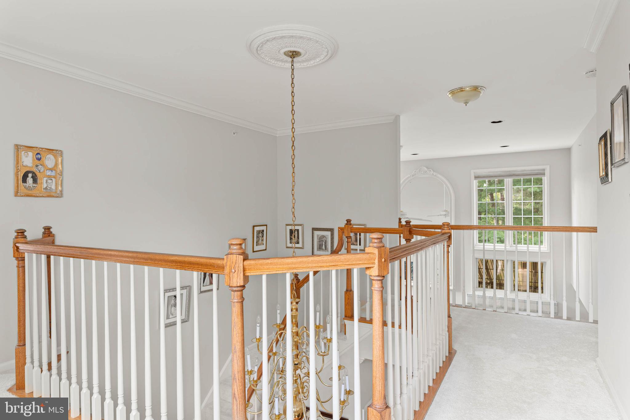4 Riders Run Newtown Square, PA 19073 - Photo 27 of 64 a view of a hallway with windows