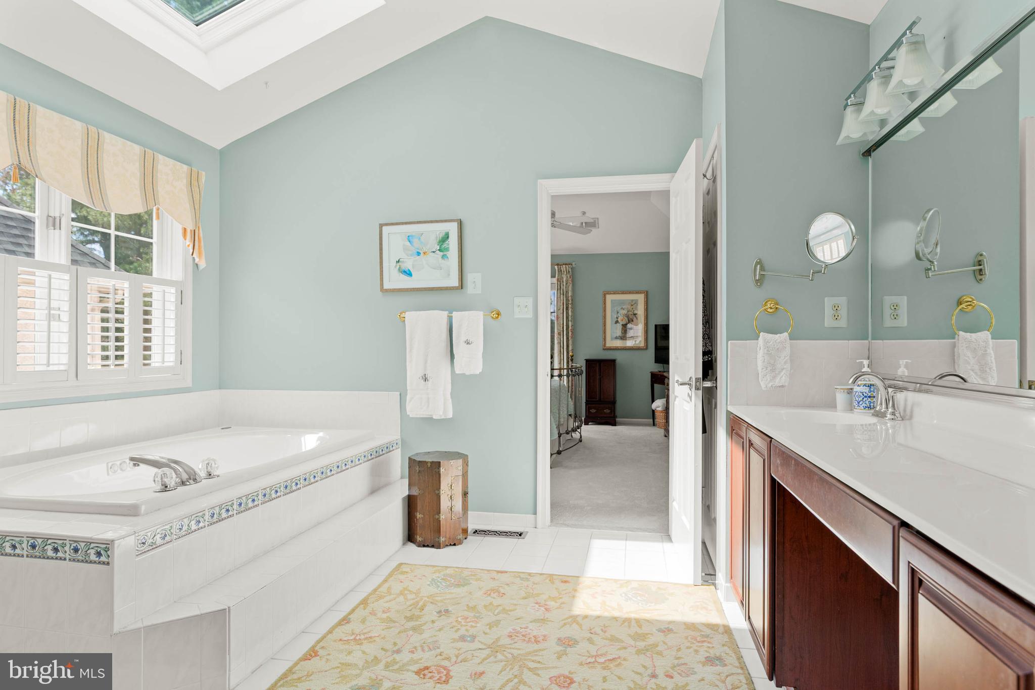 4 Riders Run Newtown Square, PA 19073 - Photo 32 of 64 a spacious bathroom with a tub sink and mirror