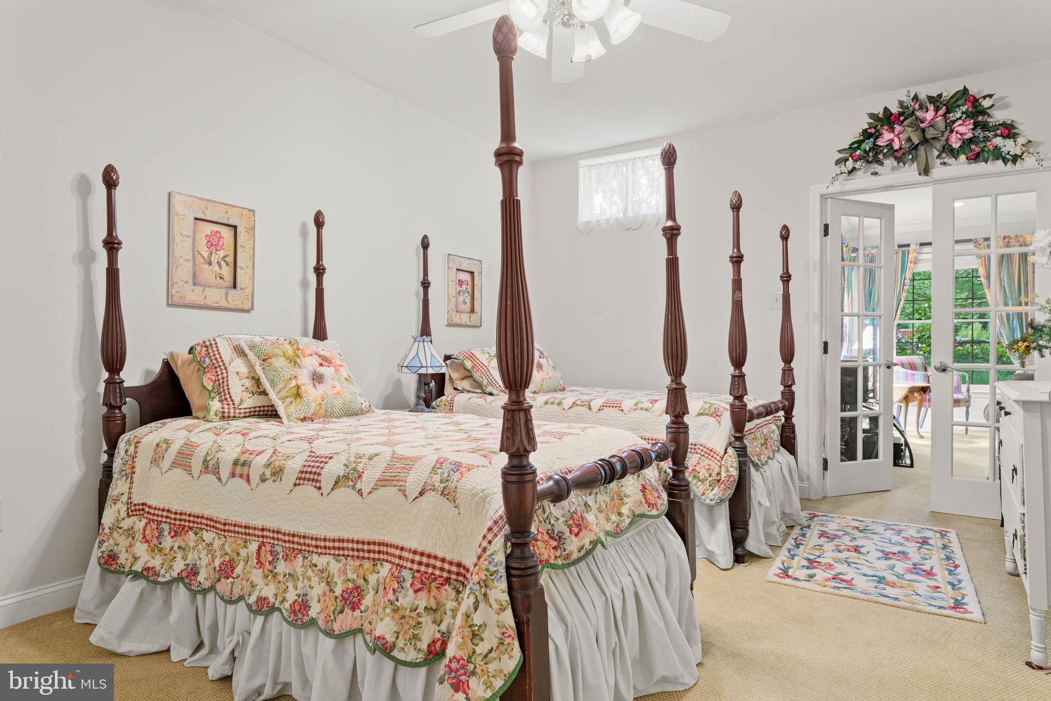 4 Riders Run Newtown Square, PA 19073 - Photo 43 of 64 a bed room with a bed mirror and a couch