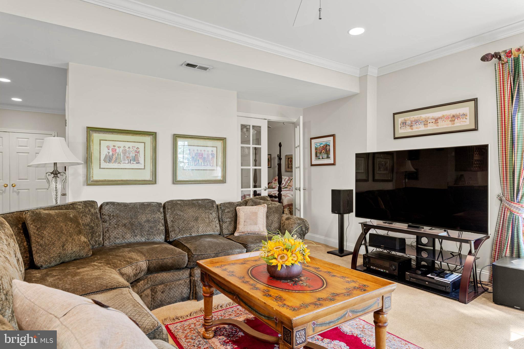 4 Riders Run Newtown Square, PA 19073 - Photo 45 of 64 a living room with furniture and a flat screen tv