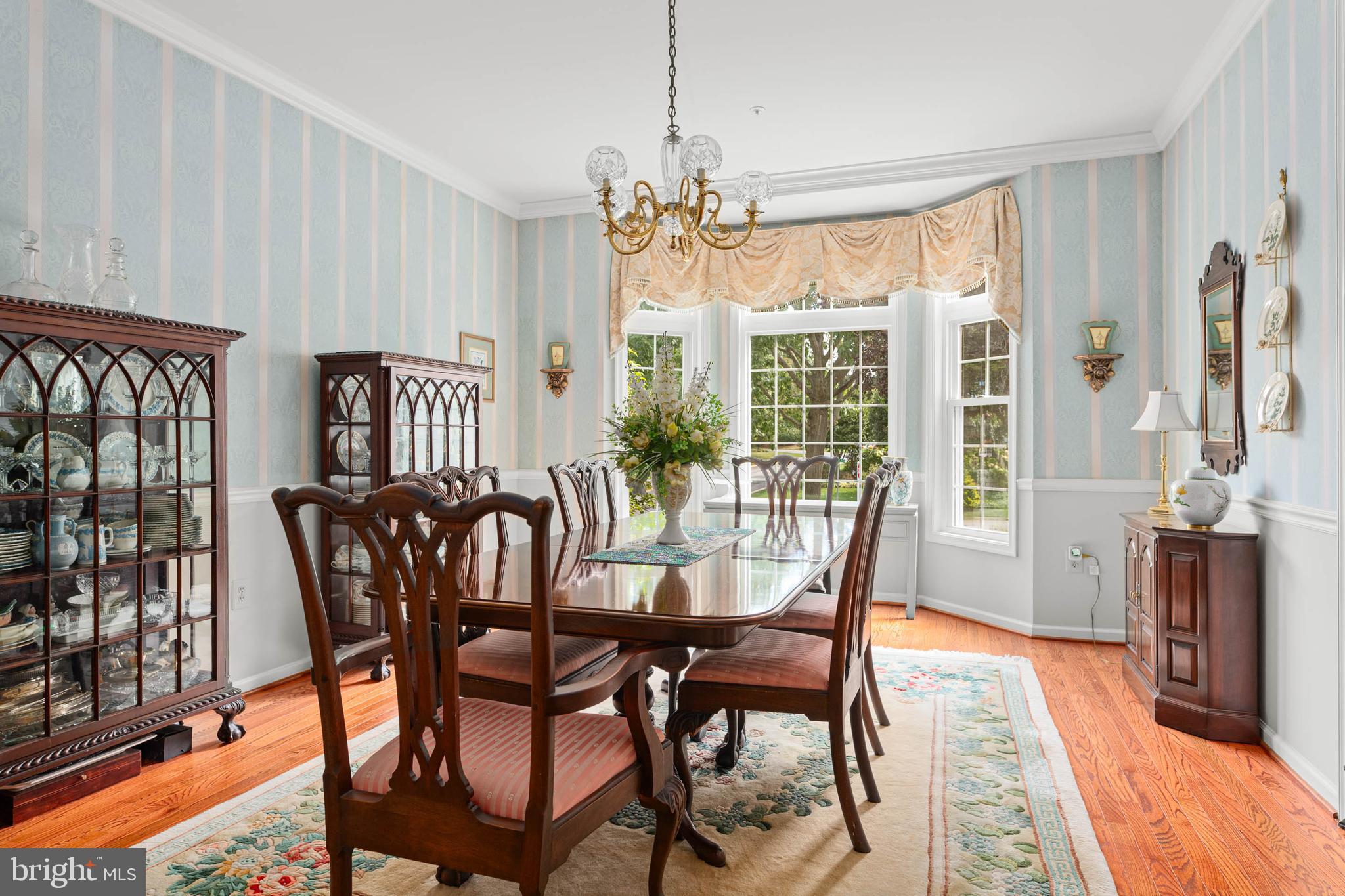 4 Riders Run Newtown Square, PA 19073 - Photo 8 of 64 a view of a dining room with furniture window and wooden floor