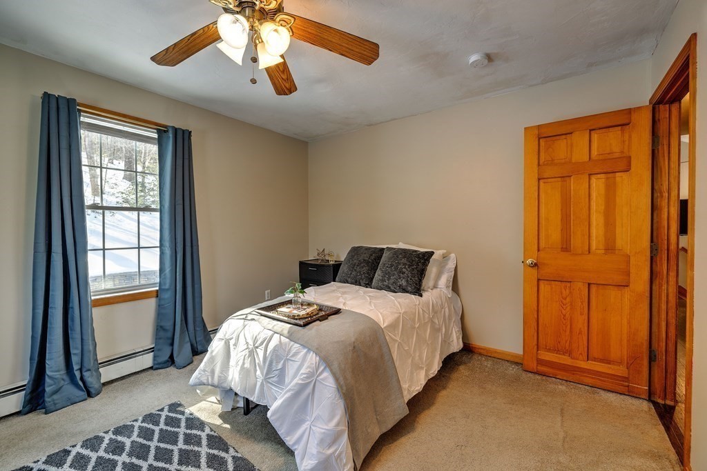 62 Vinton Road Holland, MA 01521 - Photo 19 of 37 a bedroom with a bed and a window