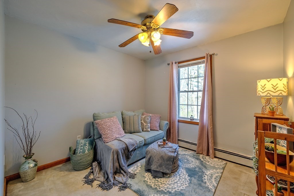 62 Vinton Road Holland, MA 01521 - Photo 23 of 37 a living room with furniture and a window