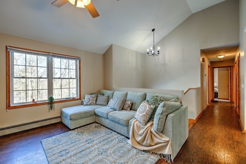 62 Vinton Road Holland, MA 01521 - Photo 9 of 37 a living room with furniture and wooden floor