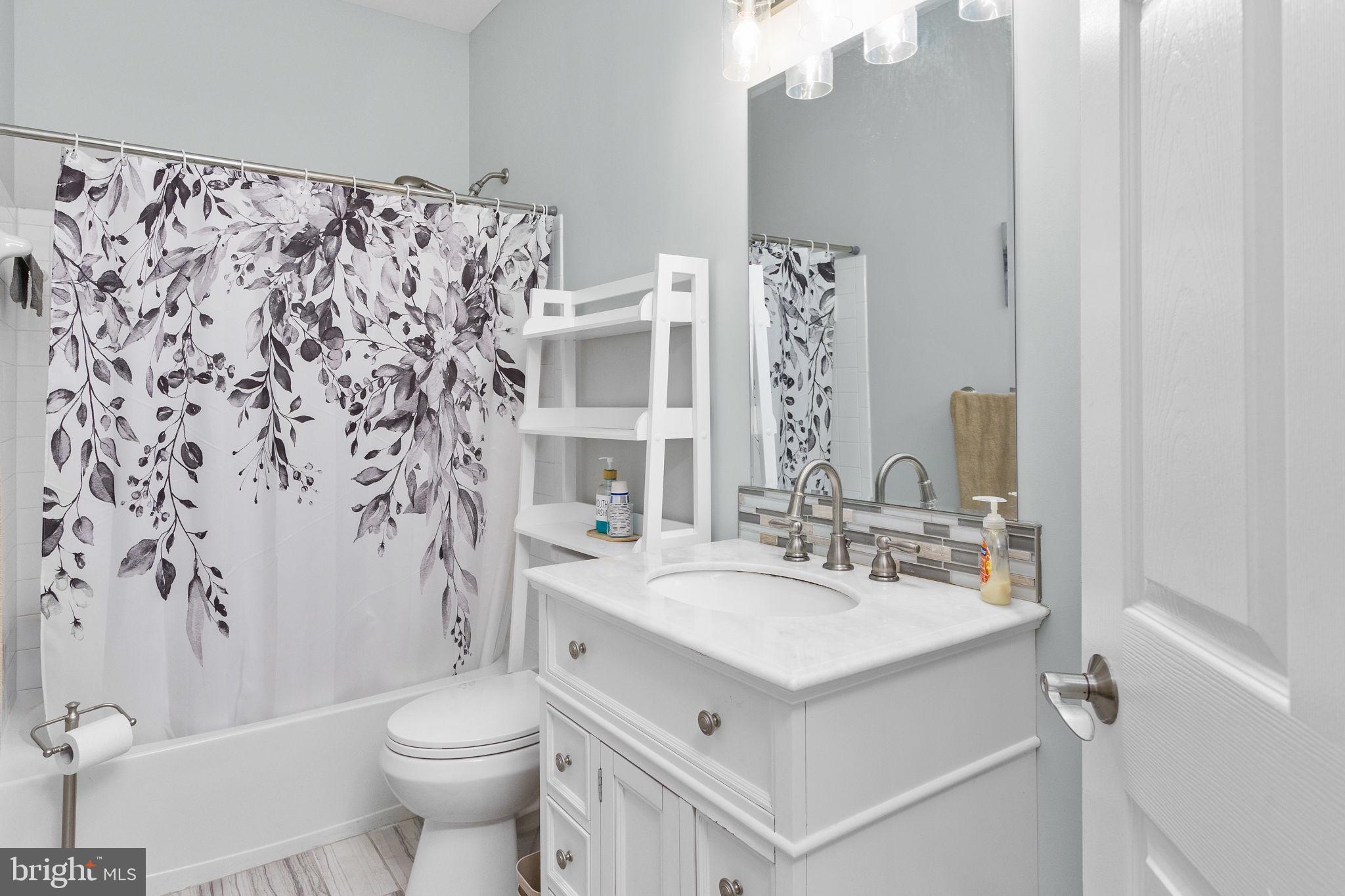 5 Tommys Meadow Pemberton, NJ 08068 - Photo 20 of 29 Serene bathroom with floral accents.