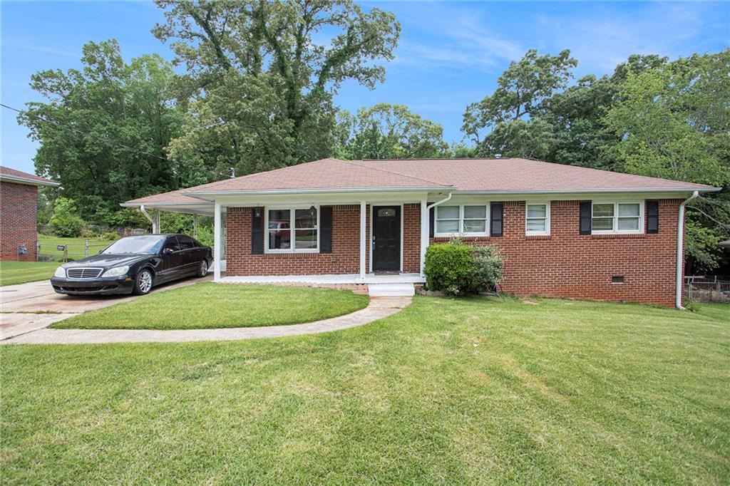 4220 Welbron Drive Decatur, GA 30035 - Photo 1 of 1 a house view with a garden space