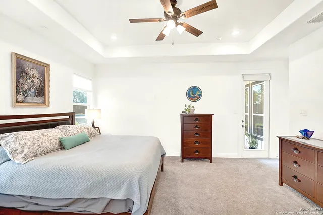 a room with pool table and mirror