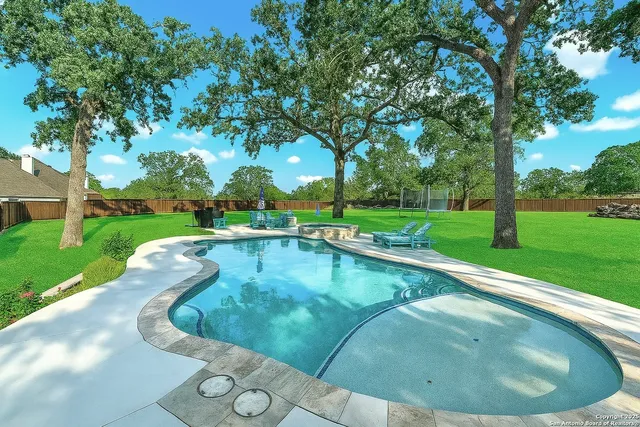 a view of garden with trees