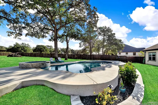 a view of a backyard with a garden