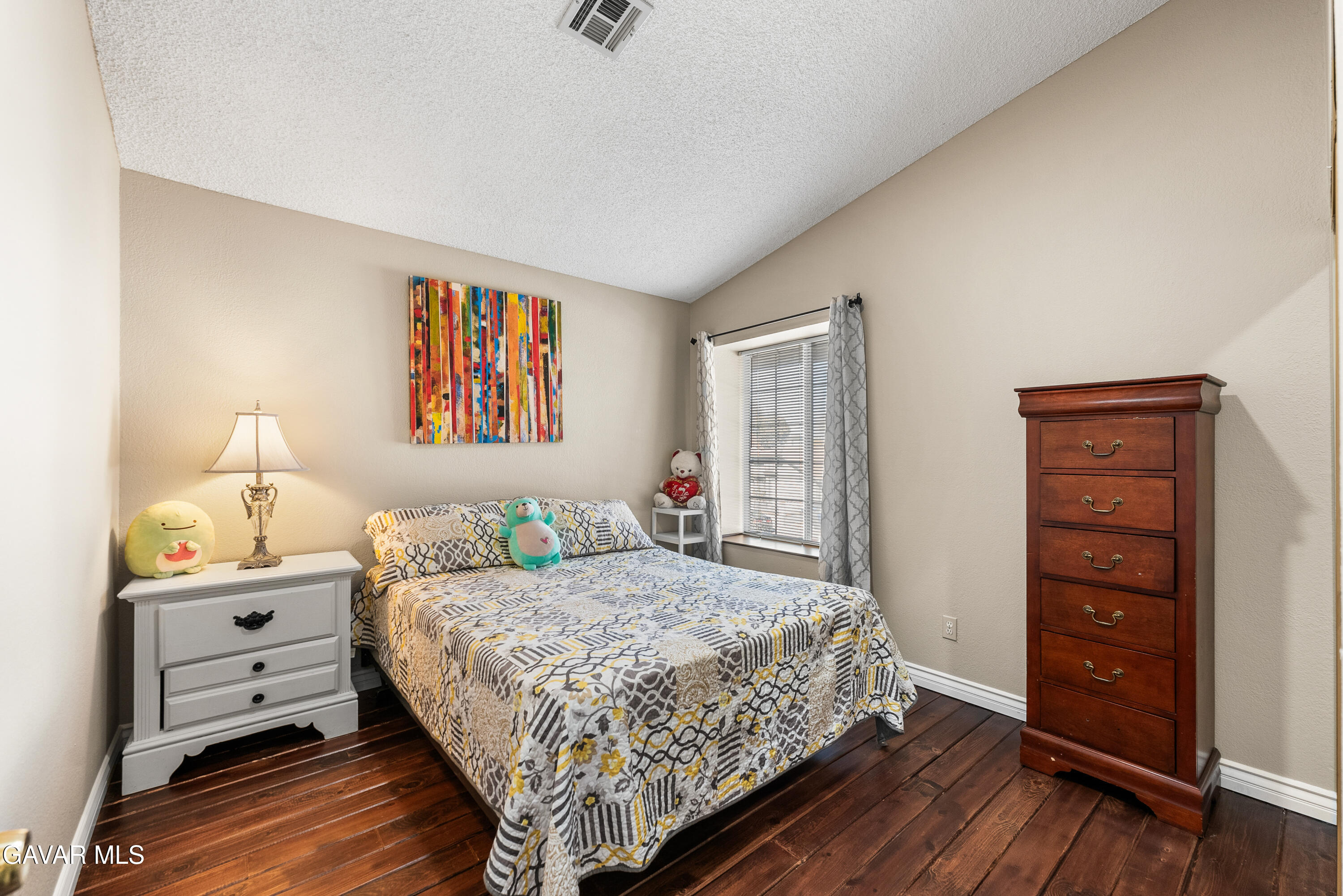 37635 Sandra Lane Palmdale, CA 93550 - Photo 40 of 46 a bedroom with a bed and a closet