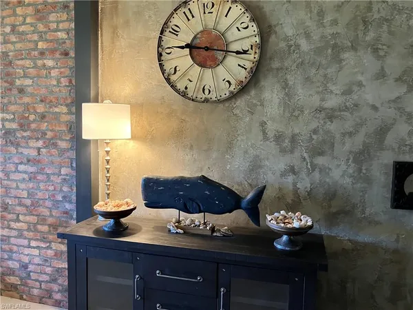 a table with a vase and a vase on it