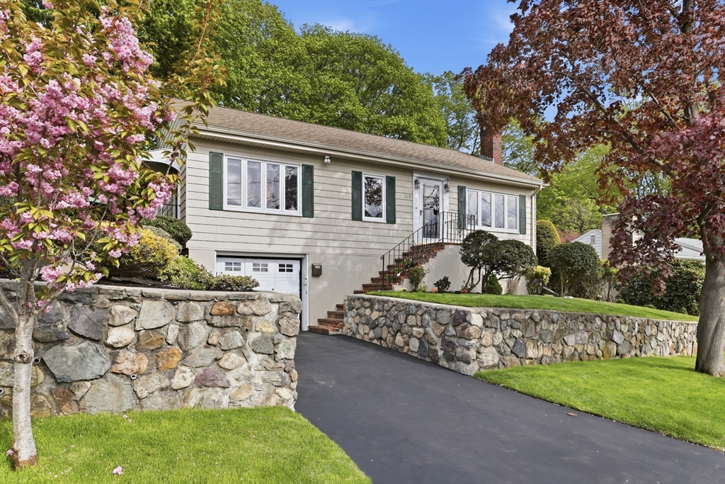 115 Collincote Street Stoneham, MA 02180 - Photo 1 of 25 a front view of a house with garden