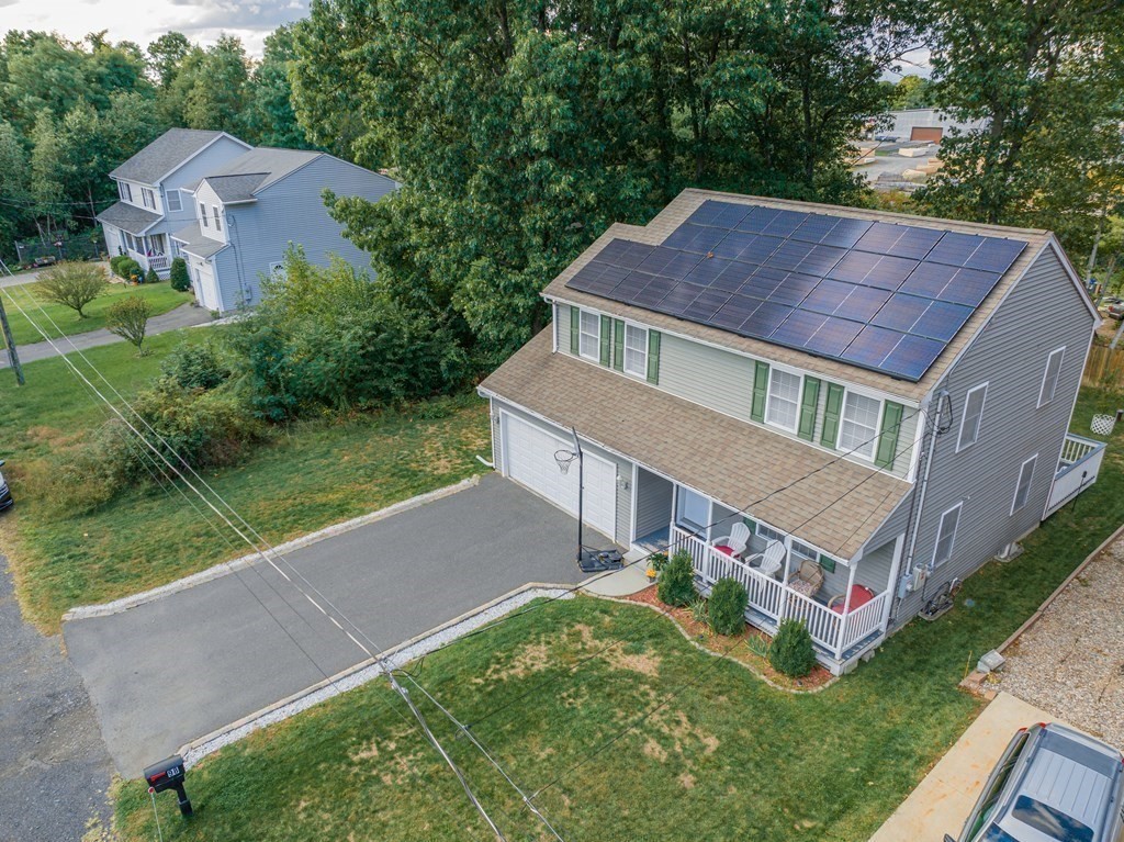 98 Briggs Street Springfield, MA 01151 - Photo 1 of 19 a aerial view of a house with a yard
