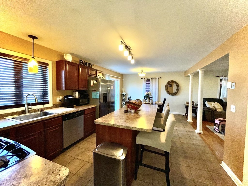 98 Briggs Street Springfield, MA 01151 - Photo 17 of 19 a view of a dining room kitchen and a sink