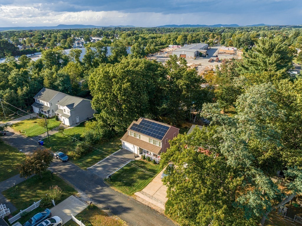 98 Briggs Street Springfield, MA 01151 - Photo 6 of 19 an aerial view of a house with a yard