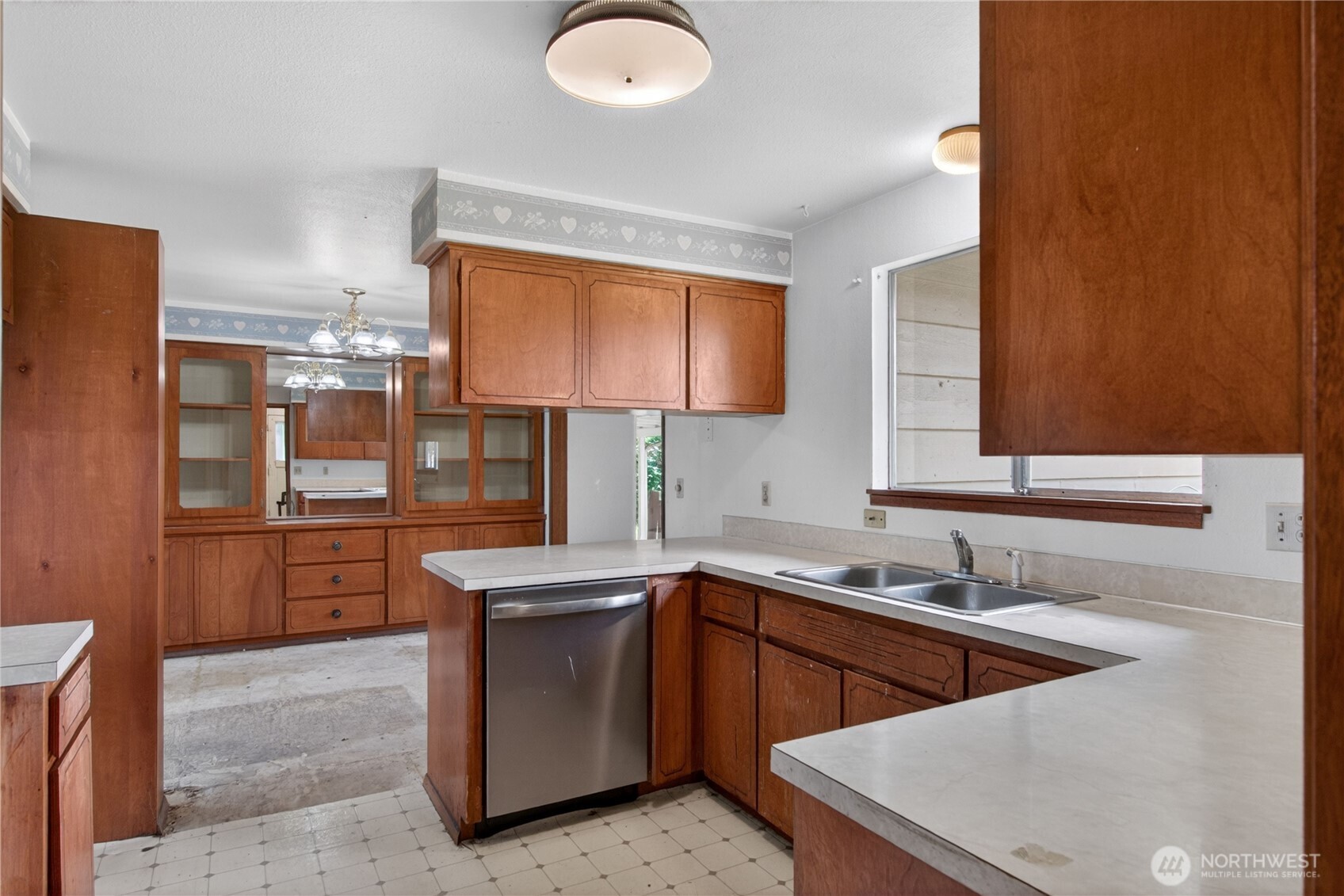 716 Murphy Way Sultan, WA 98294 - Photo 15 of 31 a kitchen with stainless steel appliances granite countertop a sink stove and refrigerator