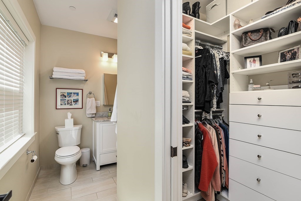 99 Brookley Road, Unit 1 Boston, MA 02130 - Photo 15 of 40 a bathroom with a toilet sink and shower