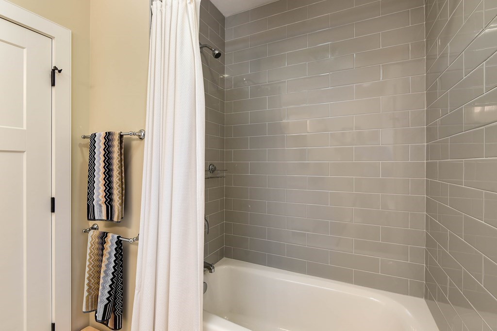 99 Brookley Road, Unit 1 Boston, MA 02130 - Photo 25 of 40 a bathroom with a bathtub