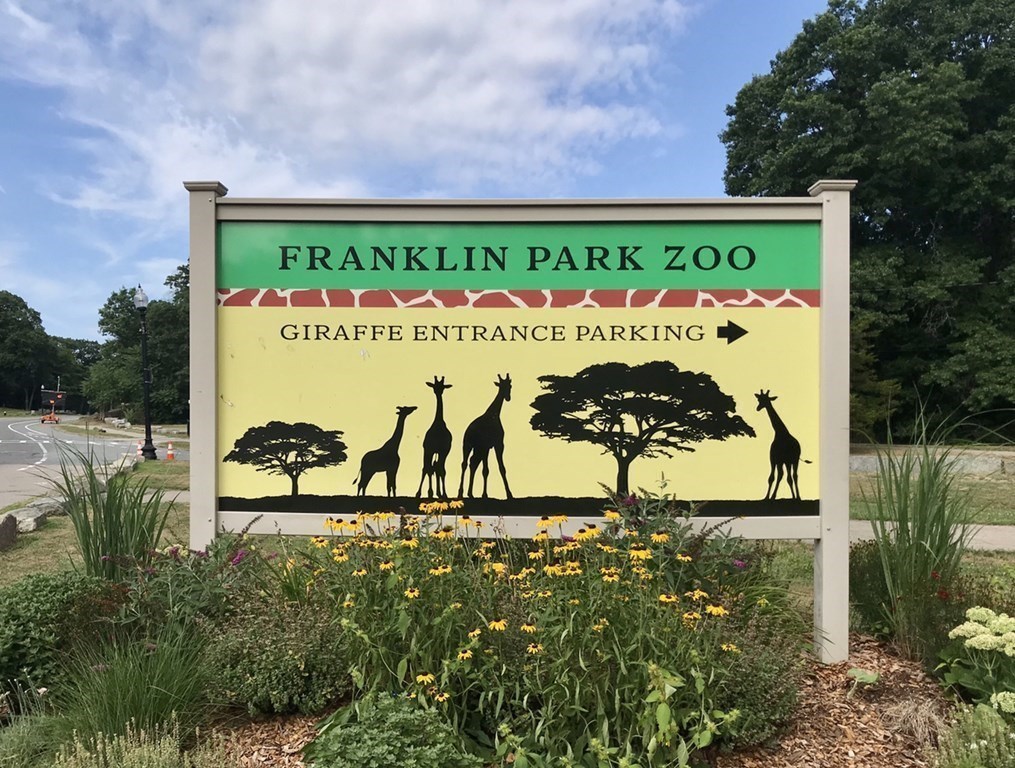 99 Brookley Road, Unit 1 Boston, MA 02130 - Photo 35 of 40 a sign on the side of the road