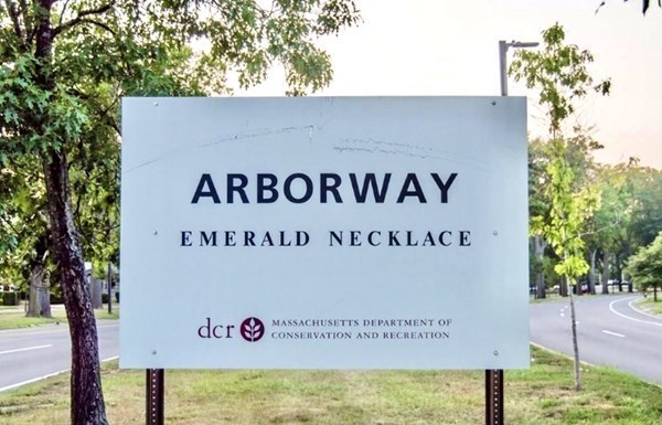 99 Brookley Road, Unit 1 Boston, MA 02130 - Photo 37 of 40 a sign that is on the wall of a building